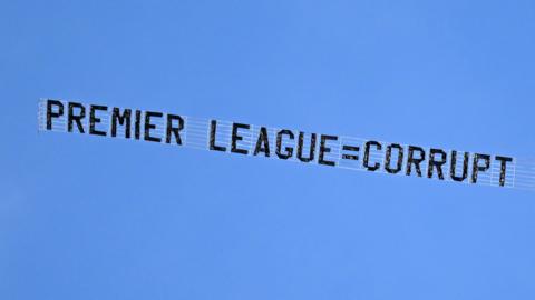 A protest banner against the Premier League from Everton fans pulled by a plane