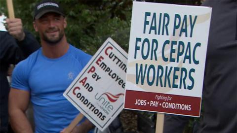 Man with placards on Cepac picket line