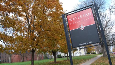 Wesleyan University sign on campus