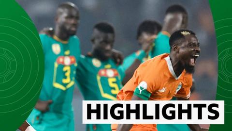 Ivory Coast's Serge Aurier celebrates their penalty shootout win over Senegal