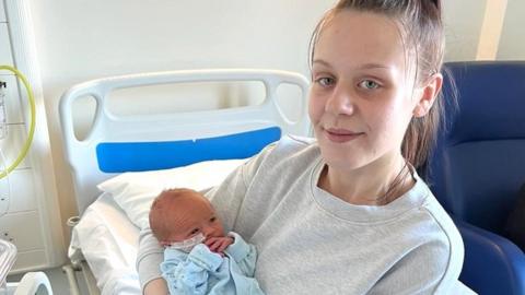New mum Georgia Hawthorne with her baby Alijah
