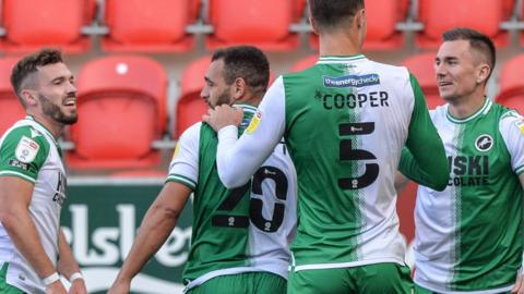 Jed Wallace celebrates with team-mates