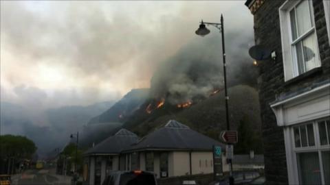 hill fire above town
