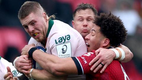 Lyon’s Mickael Guillard and Arno Botha tackle Connacht's Sean Jansen in the Champions Cup game in France