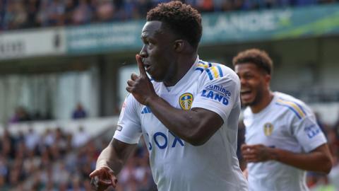 Wilfried Gnonto puts his finger to his mouth as he celebrates scoring for Leeds United at Ipswich Town