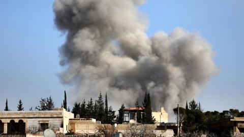 Smoke rises from the village of Khan al-Assal in Syria's Aleppo province after a reported Syrian government air strike (22 January 2020)