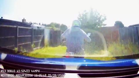 A screengrab from dashcam footage of the chase