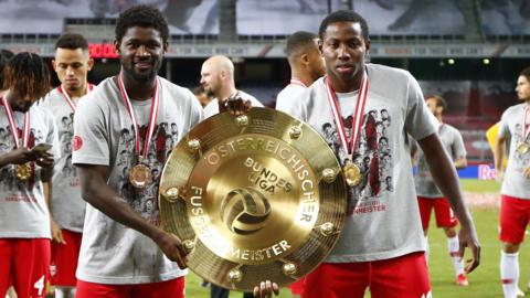 Mali duo Sekou Koita (left) with Mohamed Camara with the Austrian Bundesliga trophy