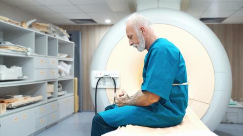Man at MRI scanning clinic
