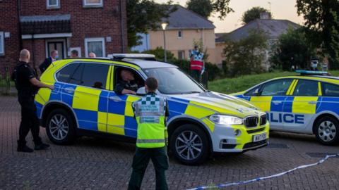 Police at the the scene on Biddick Drive following a shooting in Keyham