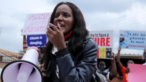 Vanessa Nakate protesting with a megaphone