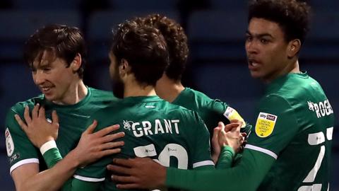 Lincoln City celebrate Conor McGrandles' goal