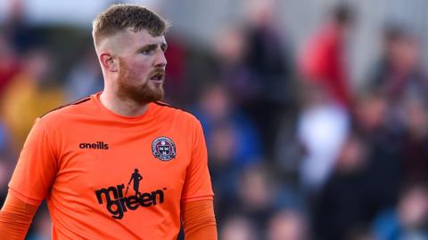 Carlisle United have signed goalkeeper Michael Kelly from Bray Wanderers in Ireland