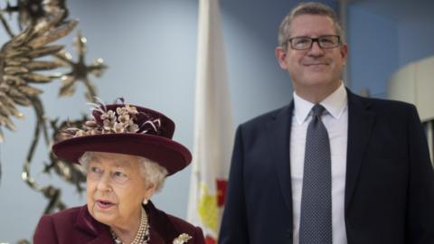 Queen Elizabeth II with Andrew Parker during a visit to MI5