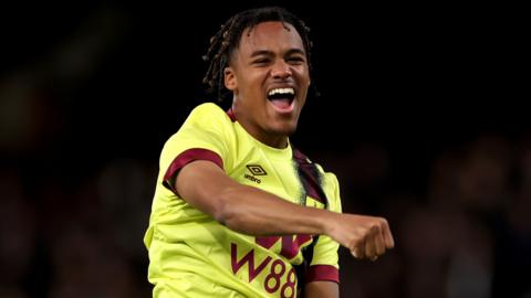 Wilson Odobert celebrates opening the scoring for Burnley against Fulham at Craven Cottage