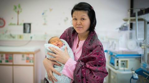 A woman at the Queen Elizabeth Hospital in Hong Kong