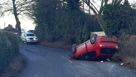 Car on roof on Lark Lane in Ripon