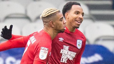 Huddersfield celebrate.