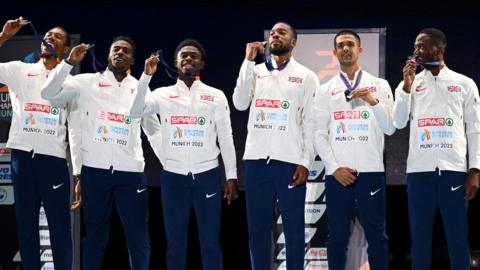 Great Britain's men's 4x100m team celebrate after receiving their European medals