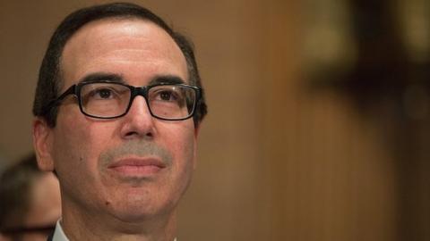 Treasury Secretary Steven Mnuchin prepares to testify at a Senate Banking Committee and International Policy hearing on Capital Hill May 18, 2017 in Washington, DC.