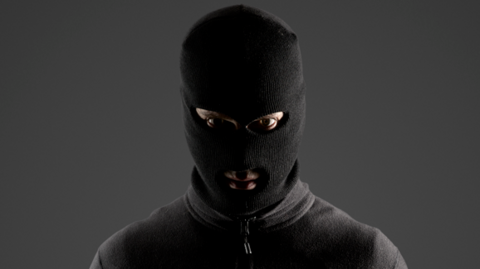A person wearing a balaclava
