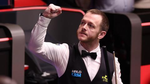 Mark Allen celebrates