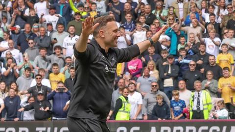 John Eustace celebrates