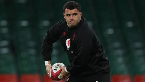 Chris Coleman warming up with Wales at Principality Stadium