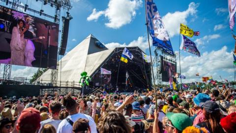 Crowds gathering round the pyramid stage at Glastonbury