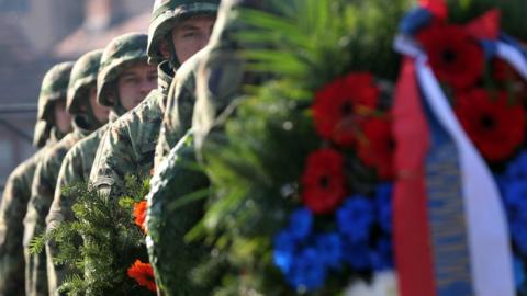 Members of a Serbian military honour guard prepare for a wreath laying ceremony at the French military cemetery during the Armistice Day commemorations marking the end of World War I, in Belgrade, Serbia, 11 November 2017