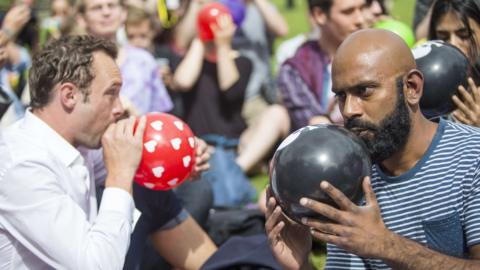 People inhaling nitrous oxide