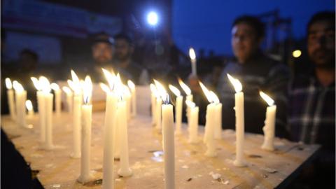 Kashmiri Muslim shouts anti-Indian slogans during a candle light protest against the rape and murder of an eight-year-old Muslim girl in Srinagar on April 13, 2018.