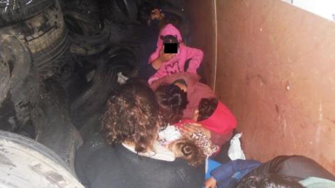 The migrants hiding among the tyres in the back of the van