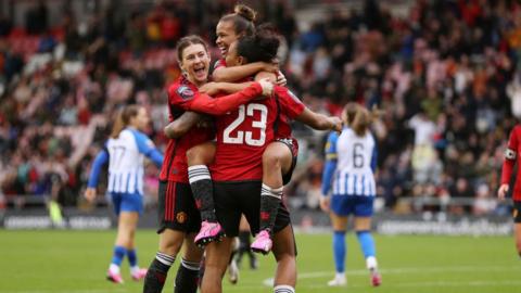 Manchester United players celebrate