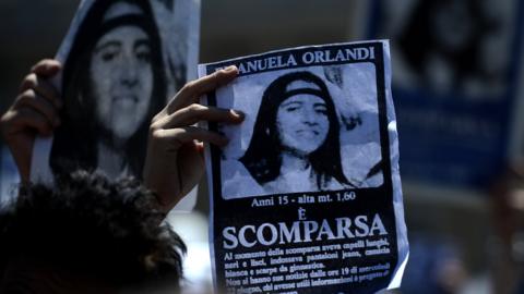 A demonstrator holds a poster of Emanuela Orlandi reading 'Missing' in St. Peter's Square, at the Vatican on May 27, 2012