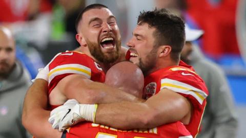 Chiefs players celebrate after the final play of the game