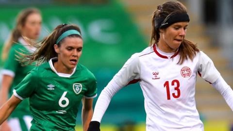 Republic of Ireland defender Jamie Finn and Denmark's Sofie Junge Pedersen