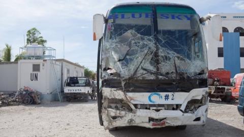 View of the bus that lost control and drove into members of a band, according to local relief officials, is impounded at a police station for further investigation, in Gonaives, north of Haiti, 12 March 2017