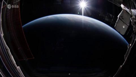 The Earth and sun in space
