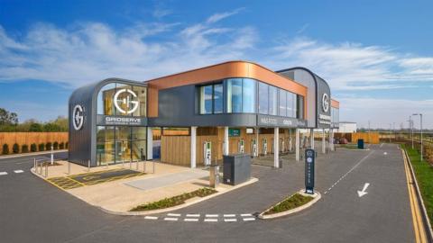 Norwich Gridserve's electric forecourt with a row of electric vehicle charging points