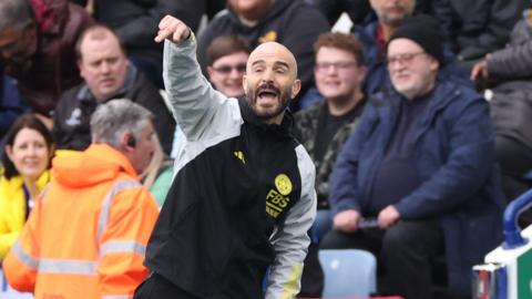 Enzo Maresca points on the touchline