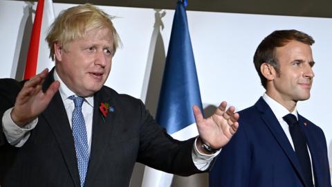 Emmanuel Macron and Boris Johnson at the G20 summit in Rome