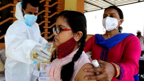 Indian medical personnel collects swab samples for coronavirus COVID-19 testing in Bhopal, India, 07 September 2020