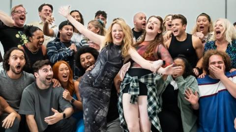 Kylie Minogue surprises cast rehearsing the I should be so lucky musical