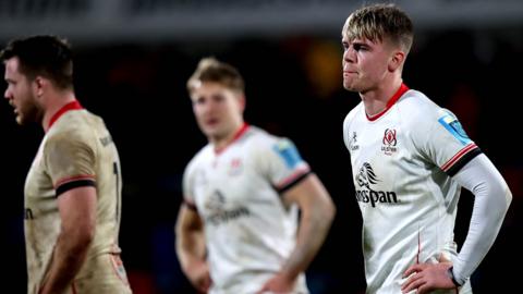 Ulster players come off the pitch dejected after the 15-14 defeat by Munster in Belfast