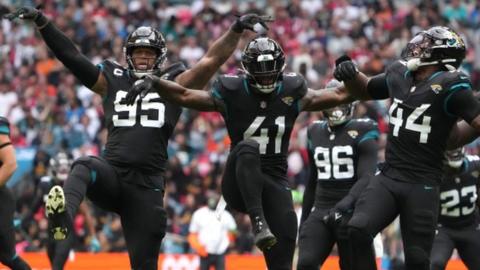 Jacksonville Jaguars players celebrate while playing the Atlanta Falcons at Wembley