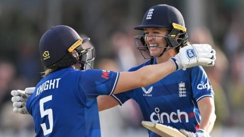 Heather Knight and Kate Cross celebrate hitting the winning runs in the first women's Ashes ODI v Australia