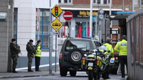 Army and police officers at the incident at Dublin's family law courts