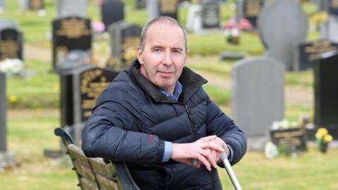 Colin Campbell in a cemetery