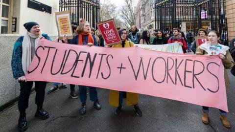 Higher and further education staff and students take part in a protest march at University College London (UCL) campus in support of university staff strikes on 27 November, 2019